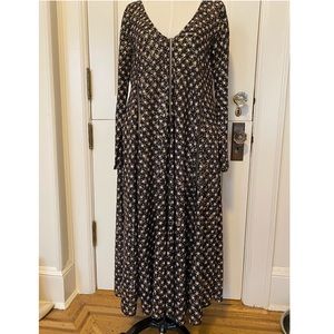 Black, white, and gold constellation Stine Goya dress